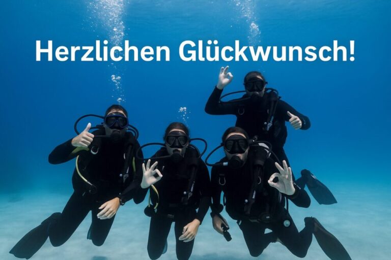 Glückliche Taucherinnen und Taucher unter Wasser im Roten Meer bei Dahab – Lagona Divers Gewinnerbild mit Text „Herzlichen Glückwunsch!“